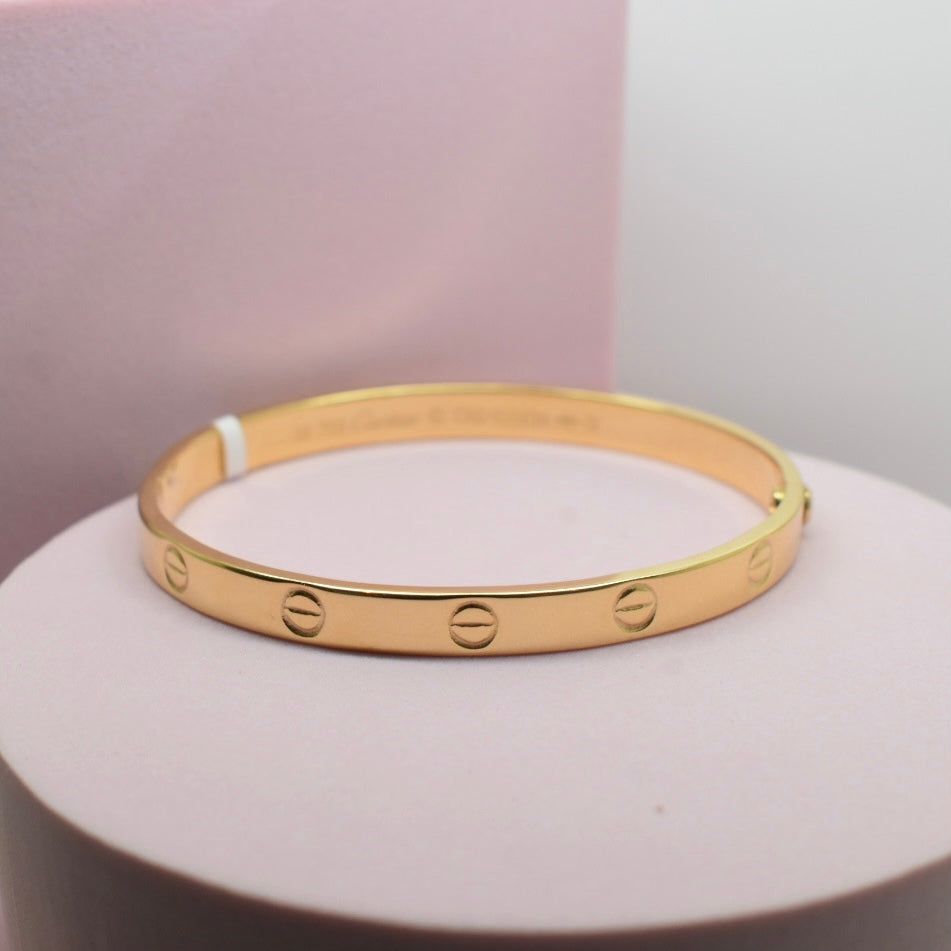 Real 18K Yellow Gold - Hollow 1 Side Screw Love Bangle
